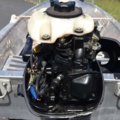 1035933-32 Buster aluminum boat on trailer and 4-stroke engine