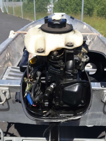 1035933-32 Buster aluminum boat on trailer and 4-stroke engine