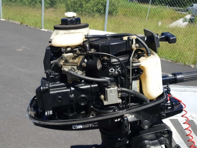 1035933-33 Buster aluminum boat on trailer and 4-stroke engine
