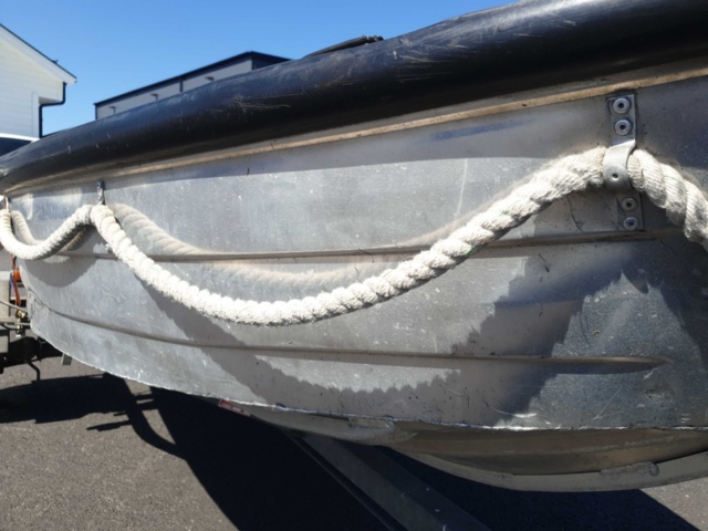 1035933-10 Buster aluminum boat on trailer and 4-stroke engine