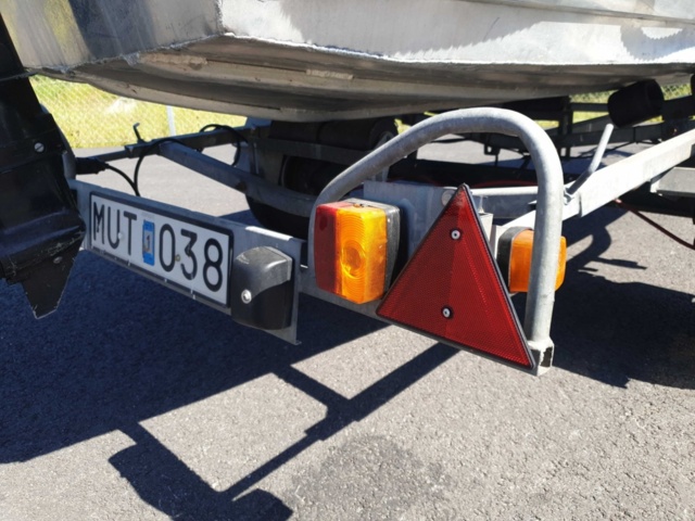 1035933-39 Buster aluminum boat on trailer and 4-stroke engine