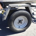 1035933-40 Buster aluminum boat on trailer and 4-stroke engine