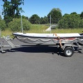 1035933-1 Buster aluminum boat on trailer and 4-stroke engine