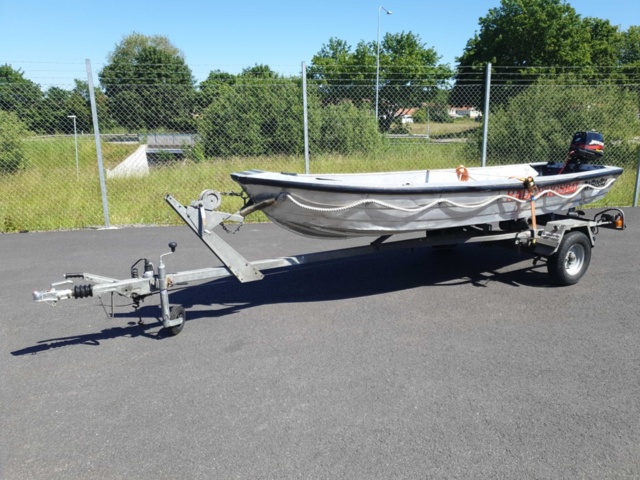 1035933-2 Buster aluminum boat on trailer and 4-stroke engine