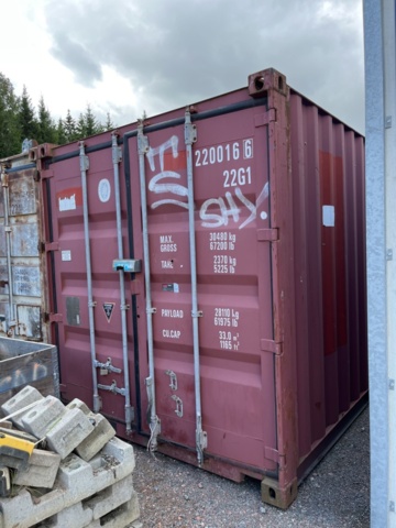 1214908-2 20-fots container med innehåll