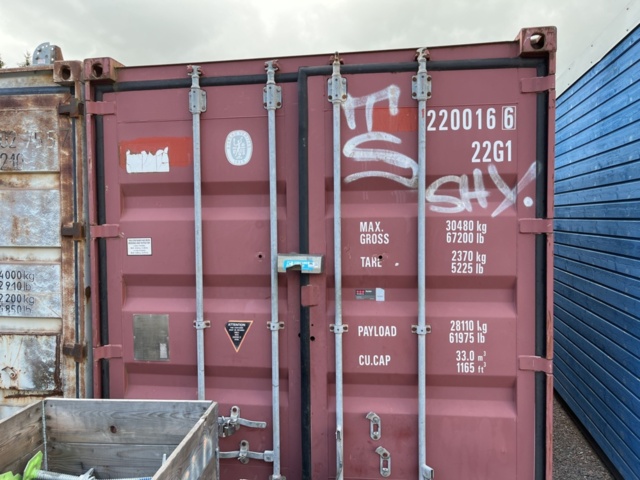 1214908-3 20-fots container med innehåll