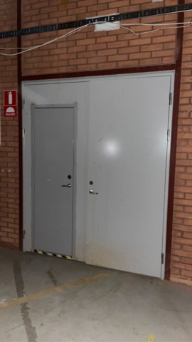 1253358-2 Steel door with a smaller and a larger door
