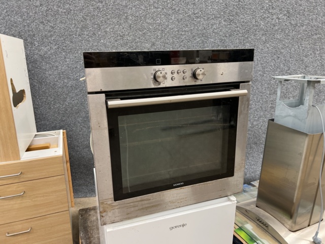 1258571-6 Disassembled kitchen with appliances