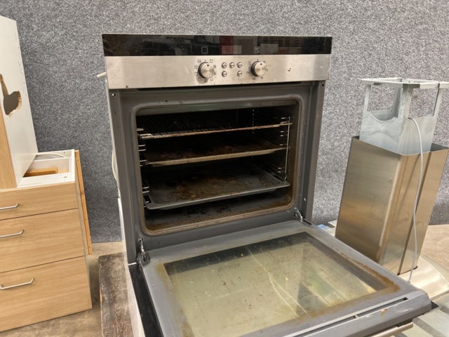 1258571-9 Disassembled kitchen with appliances