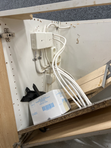 1258571-25 Disassembled kitchen with appliances