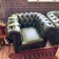 1250472-2 Chesterfield green and brown armchairs including small table