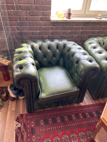 1250472-2 Chesterfield green and brown armchairs including small table