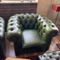 1250472-3 Chesterfield green and brown armchairs including small table
