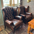 1250472-8 Chesterfield green and brown armchairs including small table