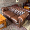 1250472-19 Chesterfield green and brown armchairs including small table