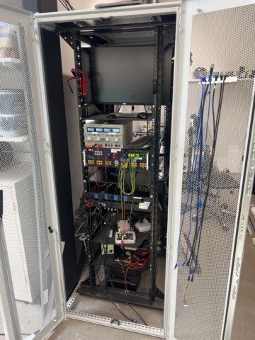 1244732-2 Server rack with test equipment for electricity