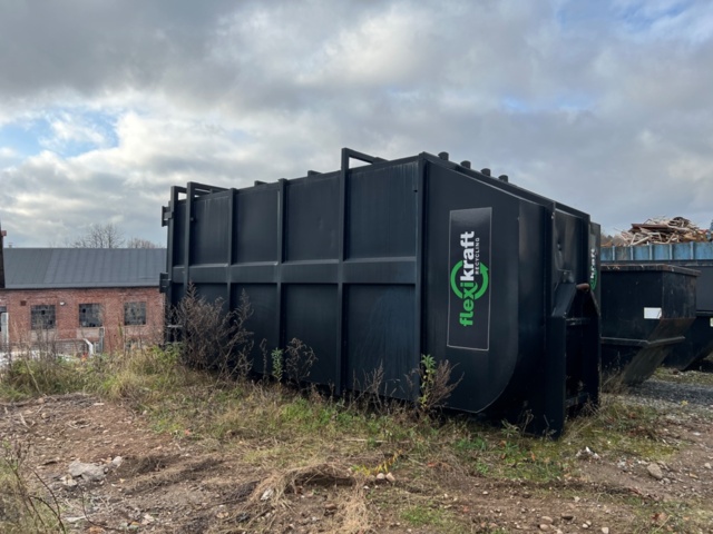 1269025-1 Komprimator med container