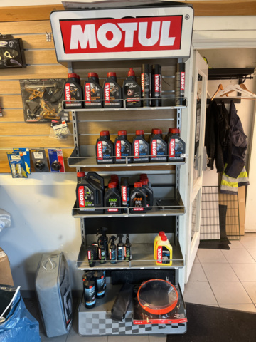 1286460-1 Display stand with oils and maintenance products - Motul