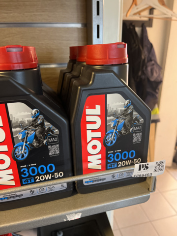 1286460-3 Display stand with oils and maintenance products - Motul