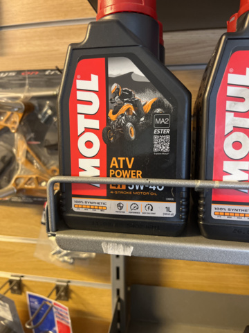 1286460-5 Display stand with oils and maintenance products - Motul