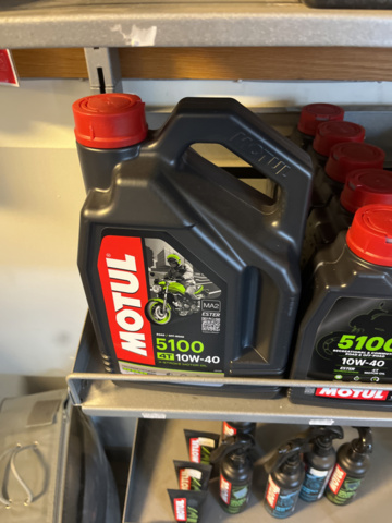 1286460-7 Display stand with oils and maintenance products - Motul