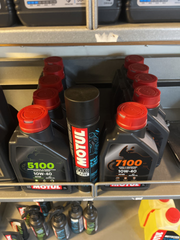 1286460-8 Display stand with oils and maintenance products - Motul