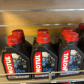 1286460-12 Display stand with oils and maintenance products - Motul