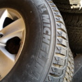 1323943-5 4pcs Studded tires on aluminum rims – Fits Mitsubishi L200 (2008)