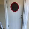1198298-1 Front door with round window 10/21