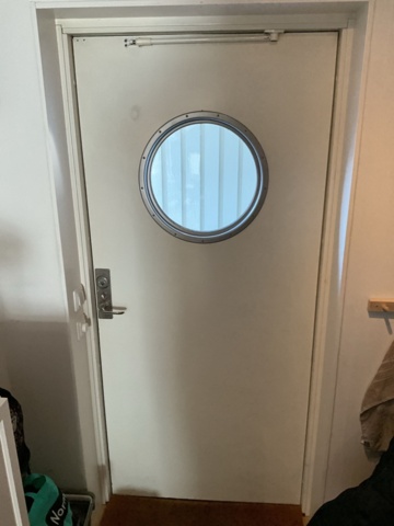 1198298-9 Front door with round window 10/21