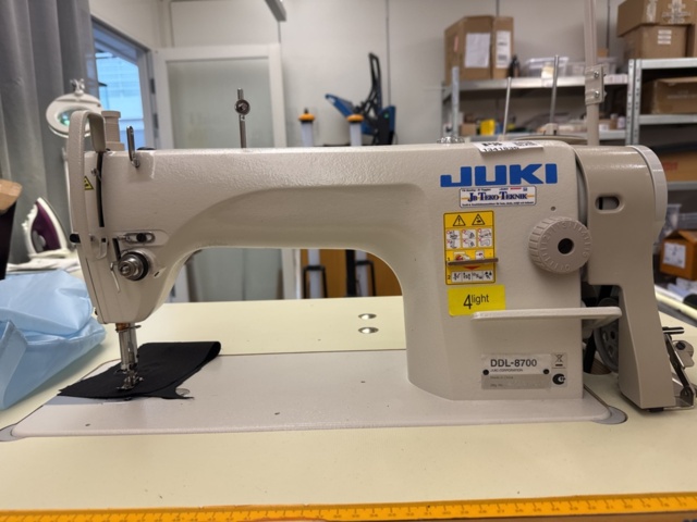 1341836-10 Industrial sewing machine – Juki DDL-8700 with mannequin and ironing board