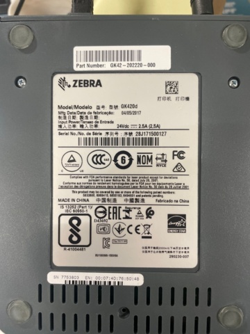 1316807-4 Desk, label printer, shelf trolleys. No content