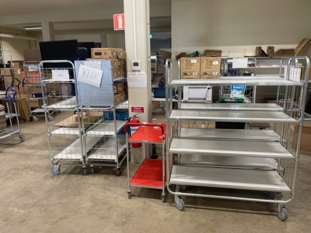 1316807-5 Desk, label printer, shelf trolleys. No content