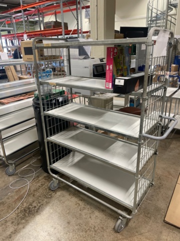 1316807-7 Desk, label printer, shelf trolleys. No content