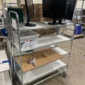 1316807-9 Desk, label printer, shelf trolleys. No content