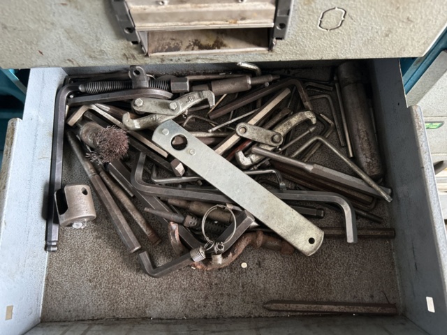 1337310-5 2 car interior shelves with mixed contents