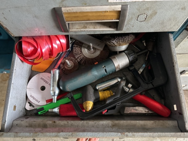 1337310-6 2 car interior shelves with mixed contents