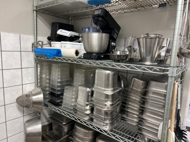 1315877-3 Warehouse shelf with contents