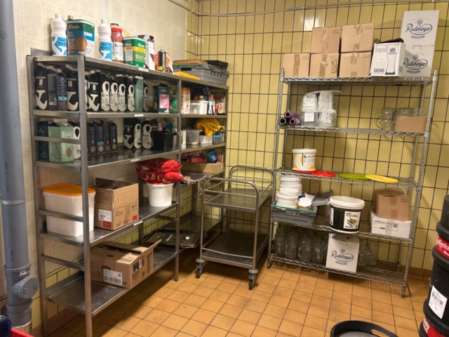 1315889-1 Warehouse shelves with contents, trolley, stainless steel bench, glass