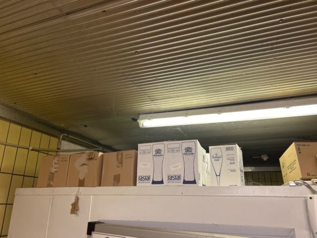 1315889-6 Warehouse shelves with contents, trolley, stainless steel bench, glass