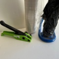 992373-2 Strap tensioners and shrink wrap