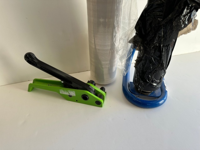 992373-2 Strap tensioners and shrink wrap
