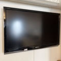 1303631-1 TV, Sharp Aquos - on wall mount