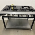 1315925-1 Gas stove with 6 burners, on wheels