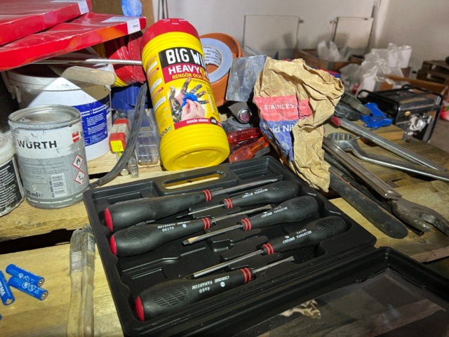 1334331-11 9 pallets and various hand tools