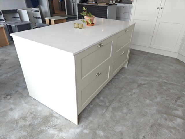 1130663-5 Fäviken Sand showroom kitchen with stone countertops and appliances from Electrolux