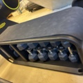 1303848-9 Sit-up bench with weight rack and dumbbells - Technogym