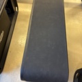 1303848-7 Sit-up bench with weight rack and dumbbells - Technogym