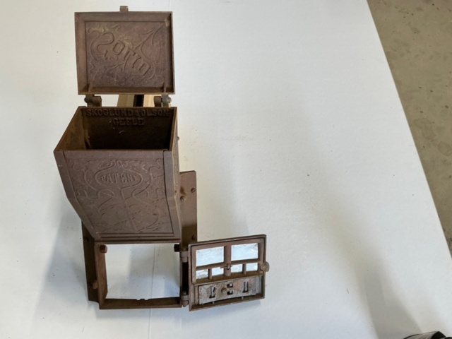 1376376-5 Cast iron cannon & cast iron front for stove