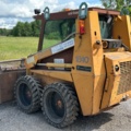 1382930-3 Case 1840 Skid Steer Loader with Two Buckets and Forks